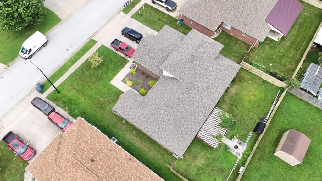 Aerial view of a completed roof replacement in a Republic, MO neighborhood