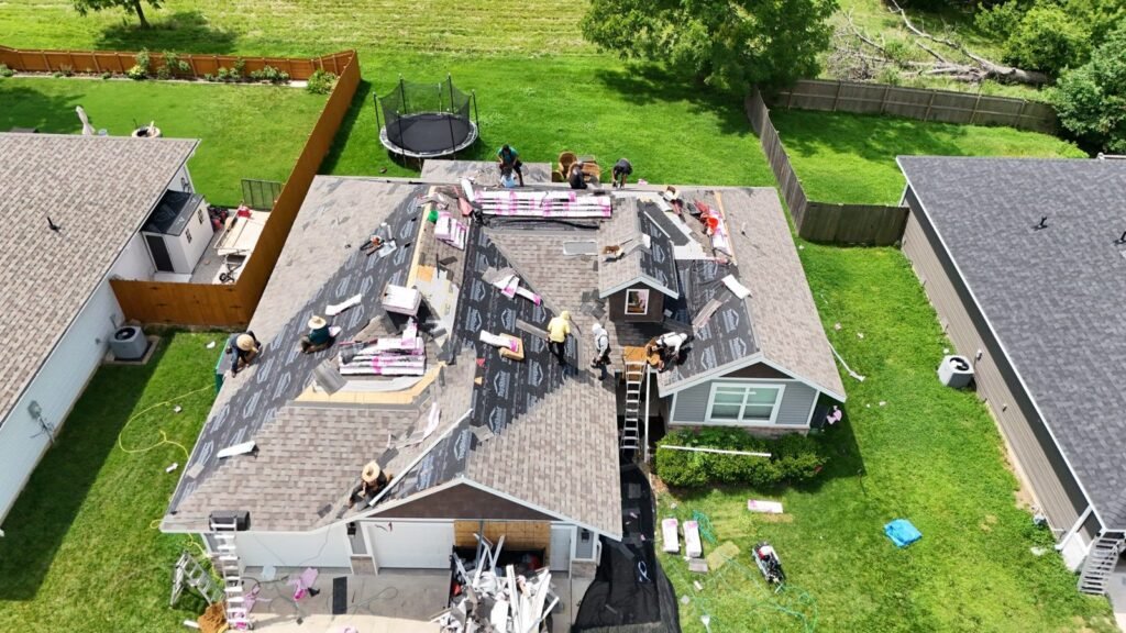 Drone view of the Bold Roofing crew replacing a hail-damaged roof in northwest Springfield, MO